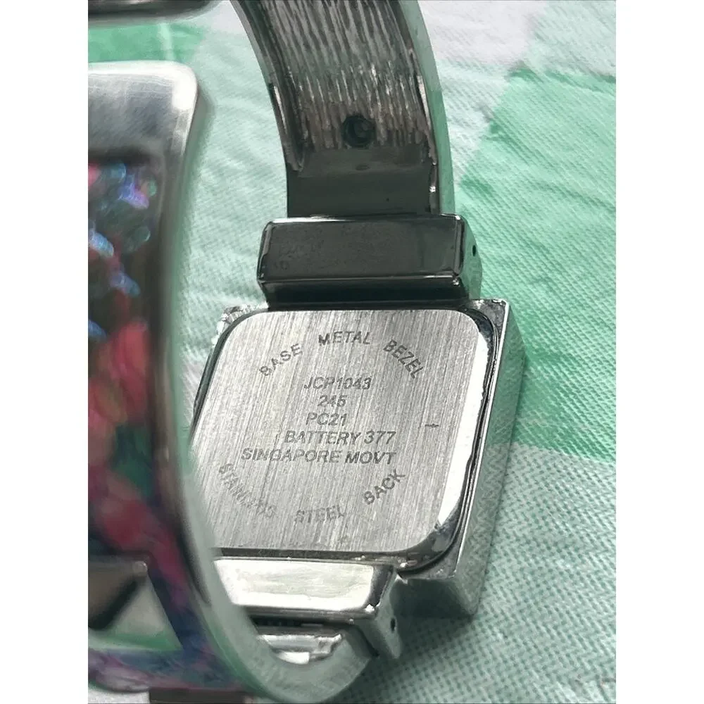 Silver Tone Pink And Multicolored Band Women’s Cuff Watch
